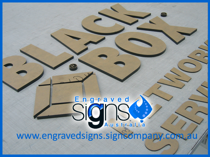 Cut out acrylic letters for signmaking. Black Box