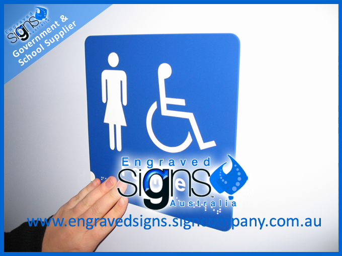 Braille Sign Supplies, hand touching a braille sign on a door