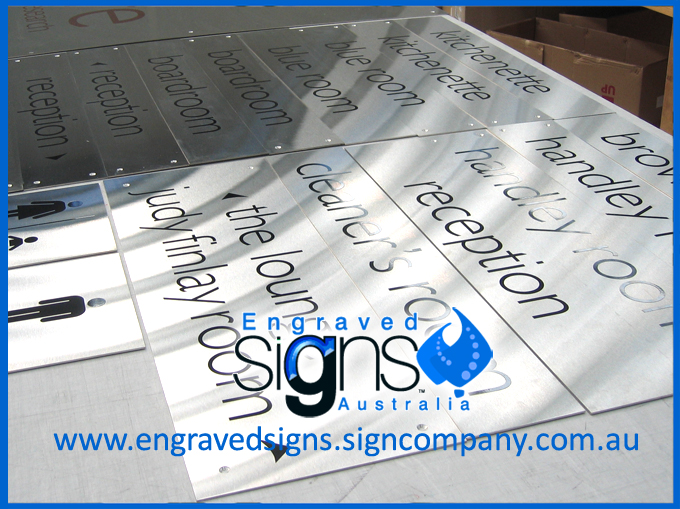 Group of Metal Signs - Directional and Wayfinding with special font