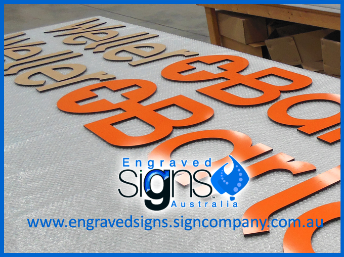 Color letters for outdoor sign being processed.